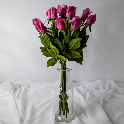 artificial Pink Real Touch Rose Buds in clear glass vase