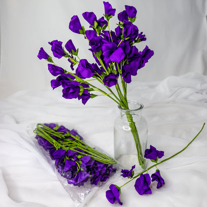 artificial Purple Sweet Pea in clear glass vase