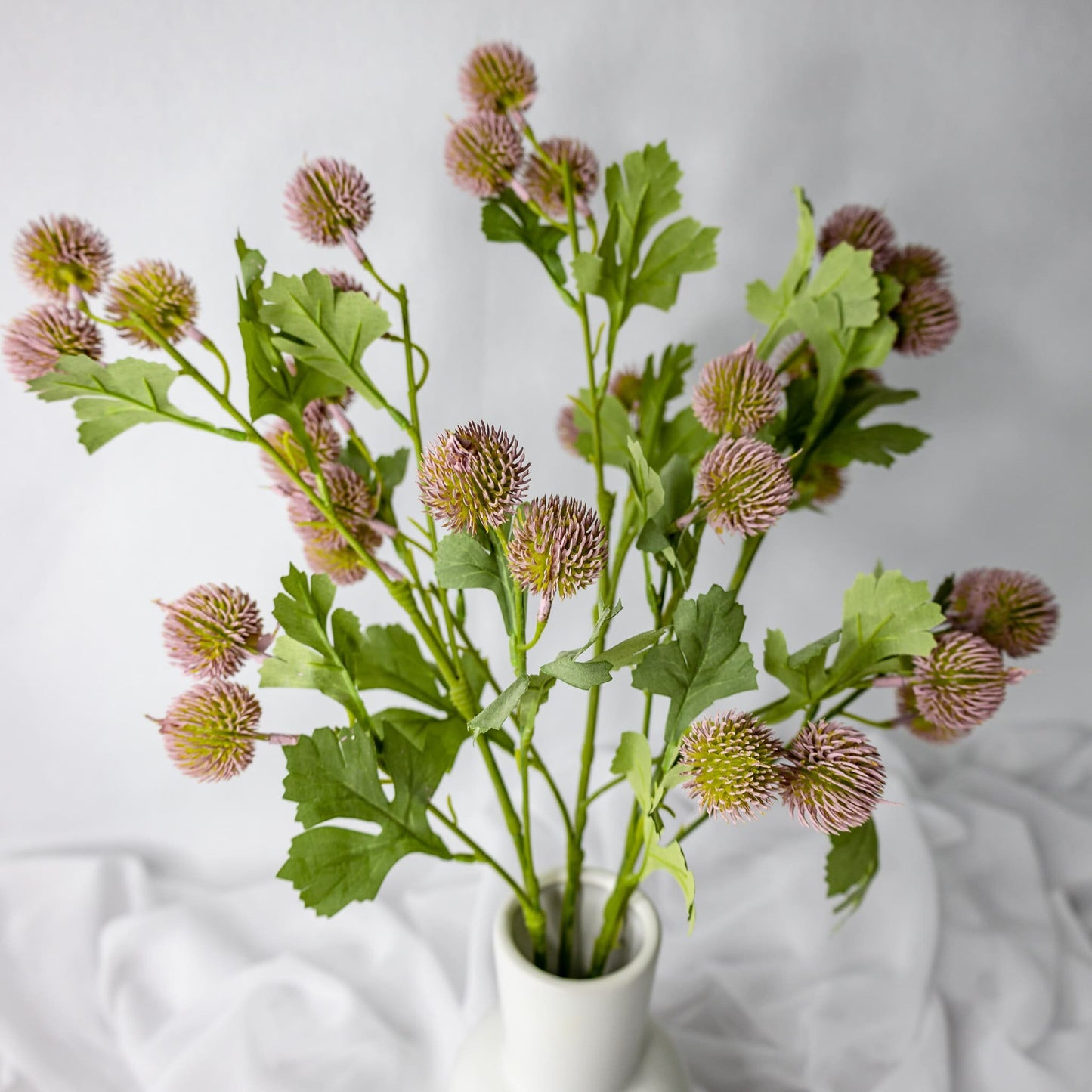 artificial Pink Pom Pom Spray in white vase top view