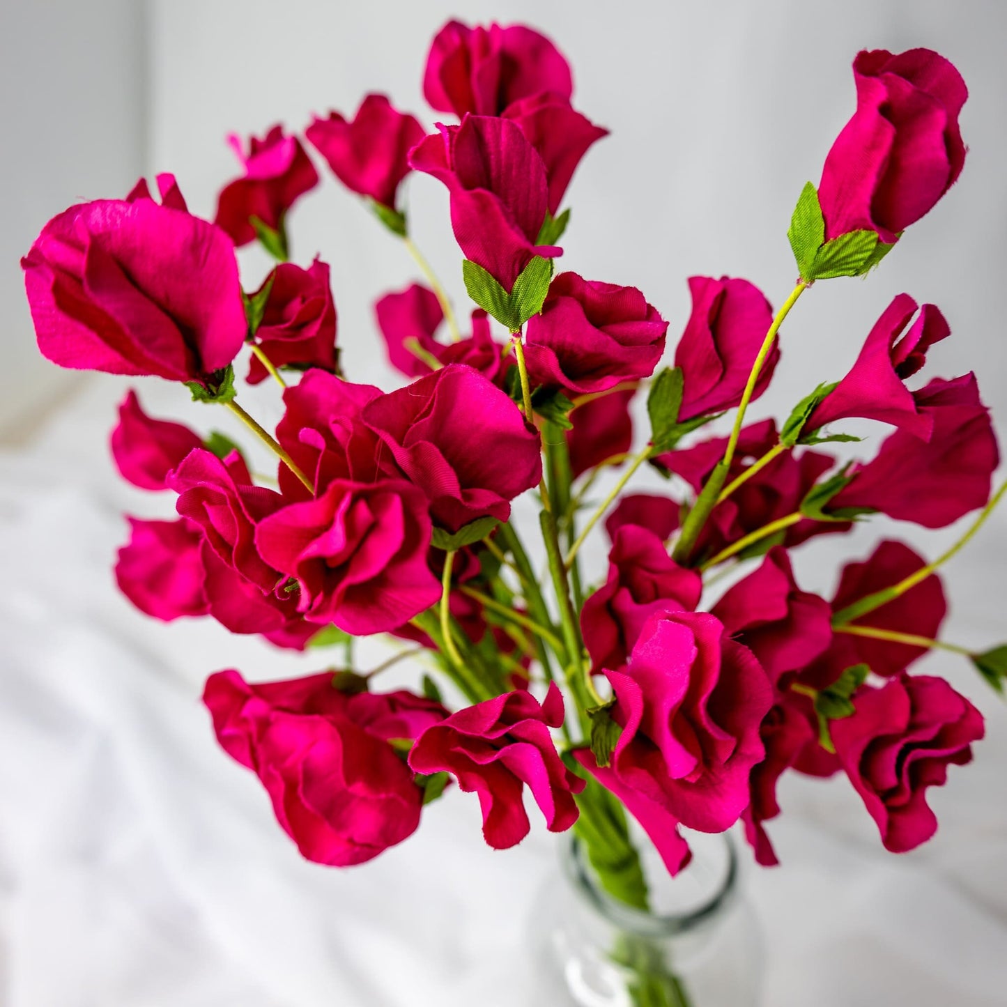 artificial Fuchsia Sweet Pea in glass vase closer look