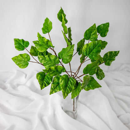 artificial Clematis Vine in glass vase