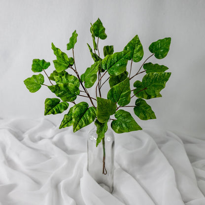 artificial Clematis Vine in glass vase