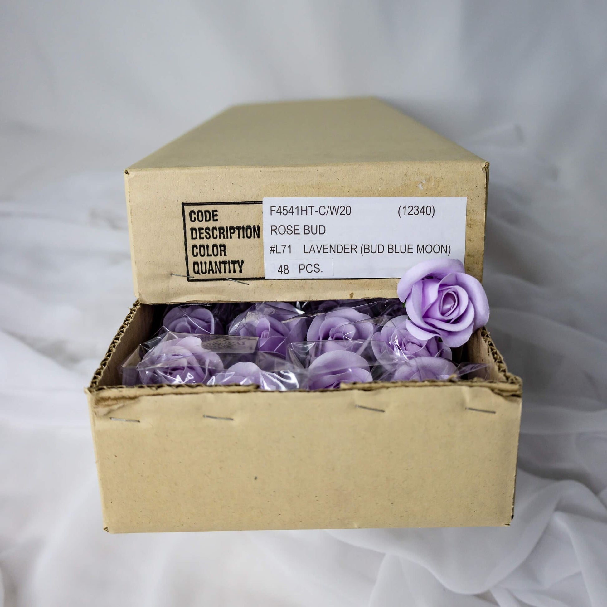 artificial Blue Moon Velveteen Buds inside the box