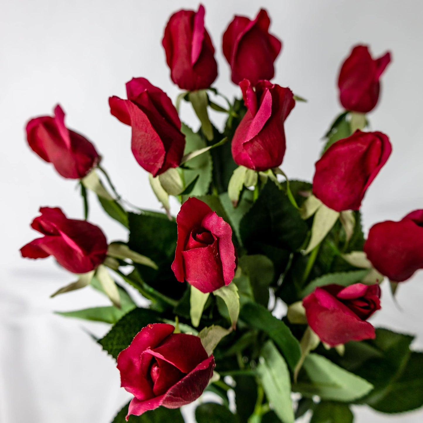 artificial red rose buds top view