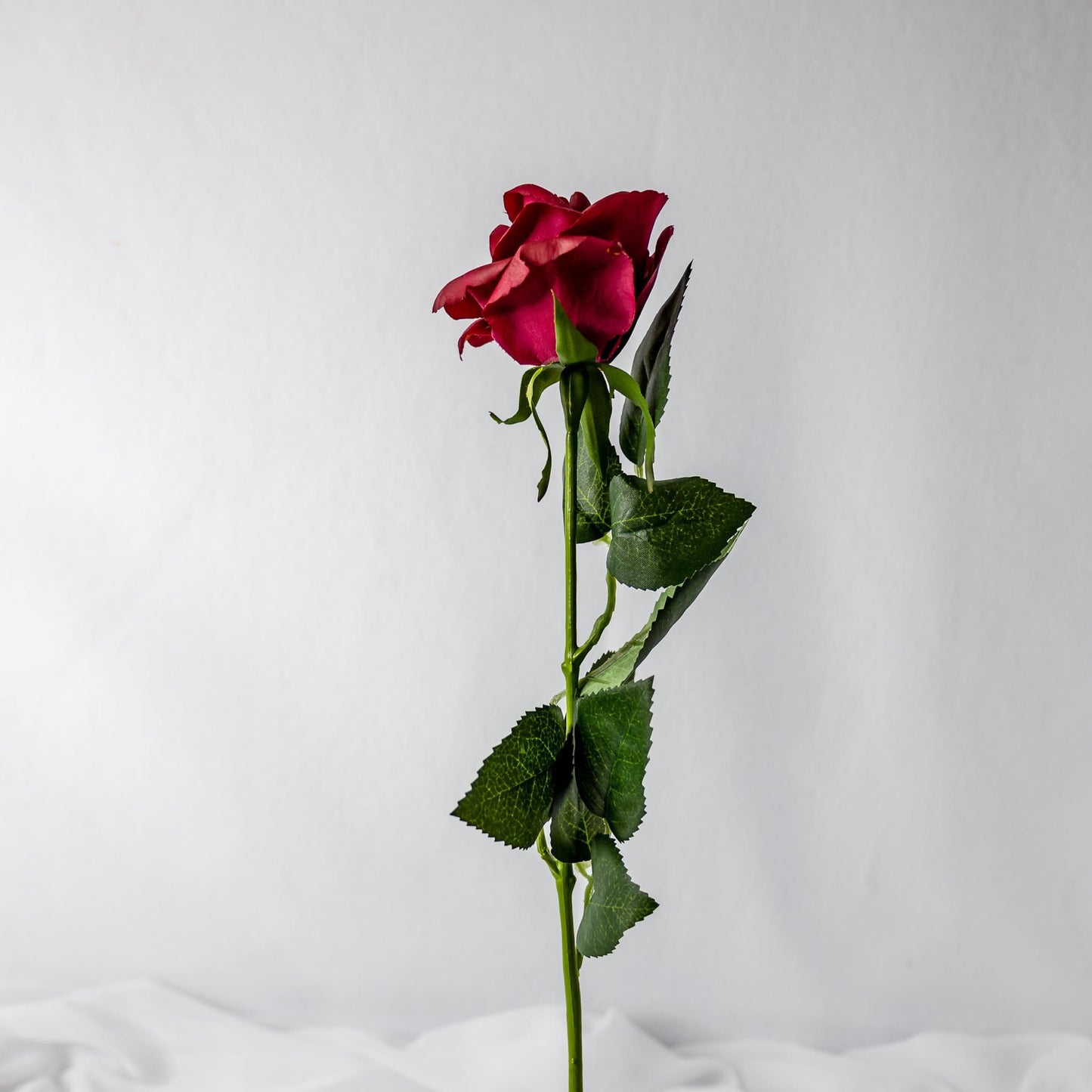 artificial red open bloom rose