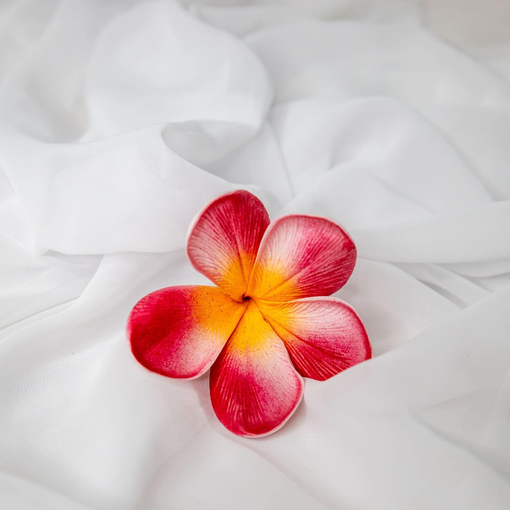 artificial red orange frangipani flower