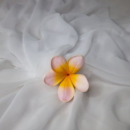 artificial pale frangipani flower