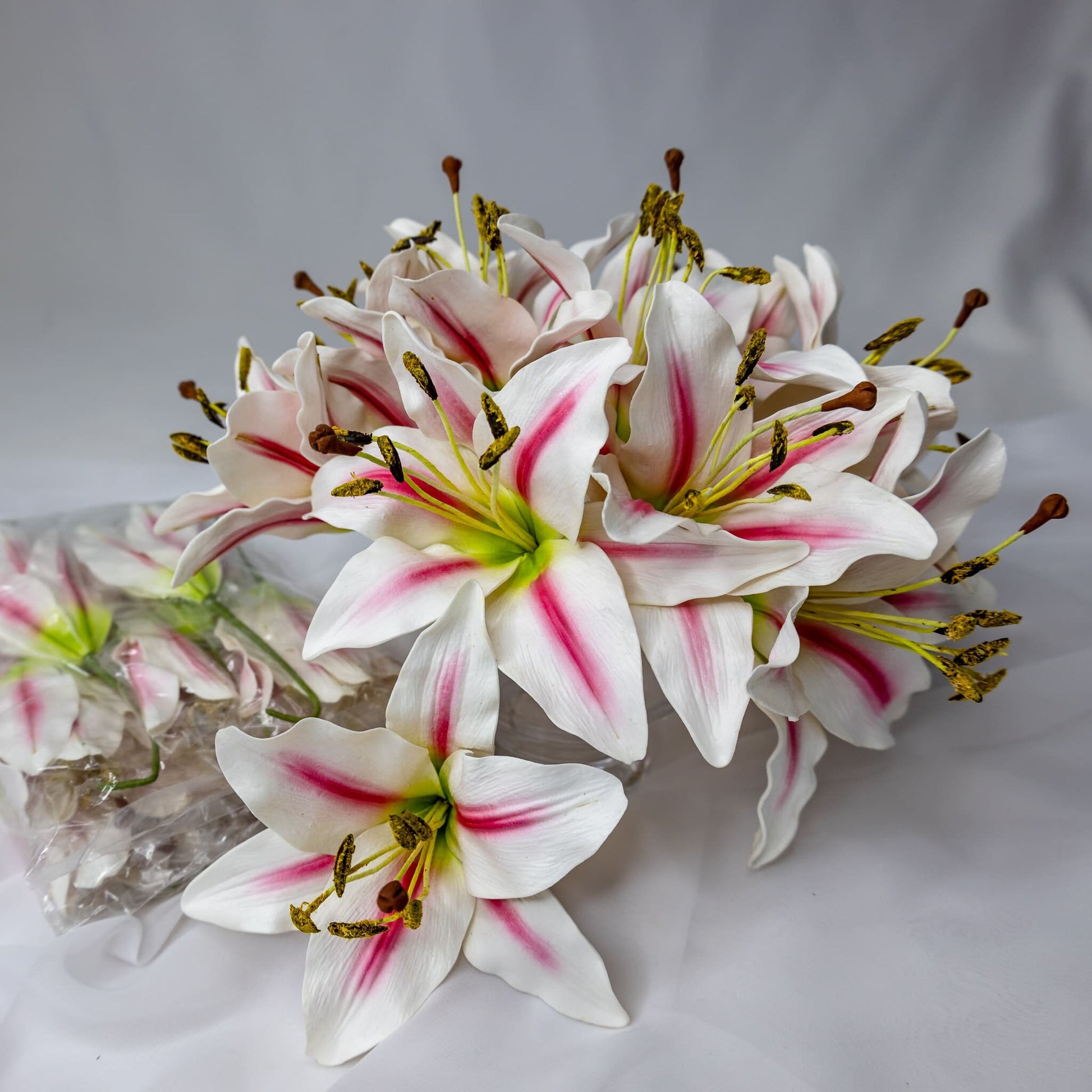 artificial White/Pink Stripe Asiatic Lily Flowerhead in glass vase