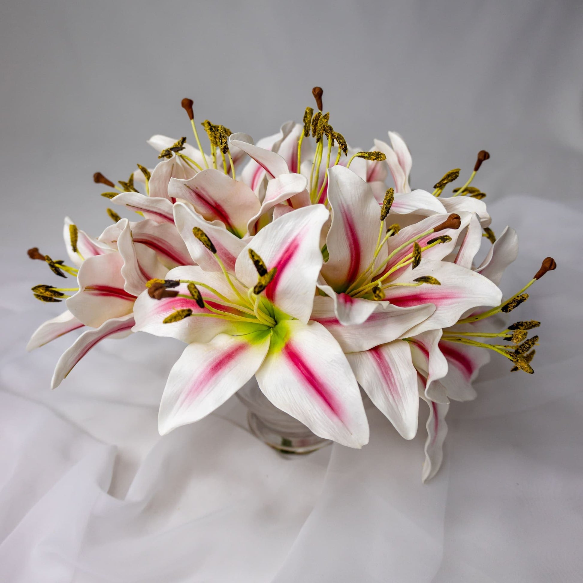 artificial White/Pink Stripe Asiatic Lily Flowerhead in glass vase